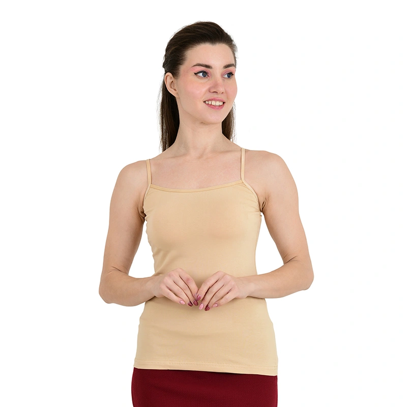 Beige nude spaghetti strap camisole with maroon skirt - fashion ecommerce photography by Lohar Studio Delhi